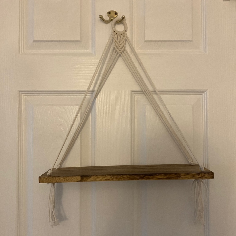 The shelf is a brown with a wooden look